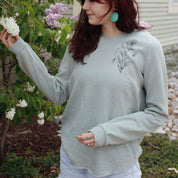 woman wearing lightweight sage hoodie
