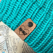 knitted beanie with leather patch