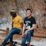 man wearing colorado live free stay wild black tee