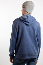 man wearing navy blue colorado flag fleece unisex sweatshirt