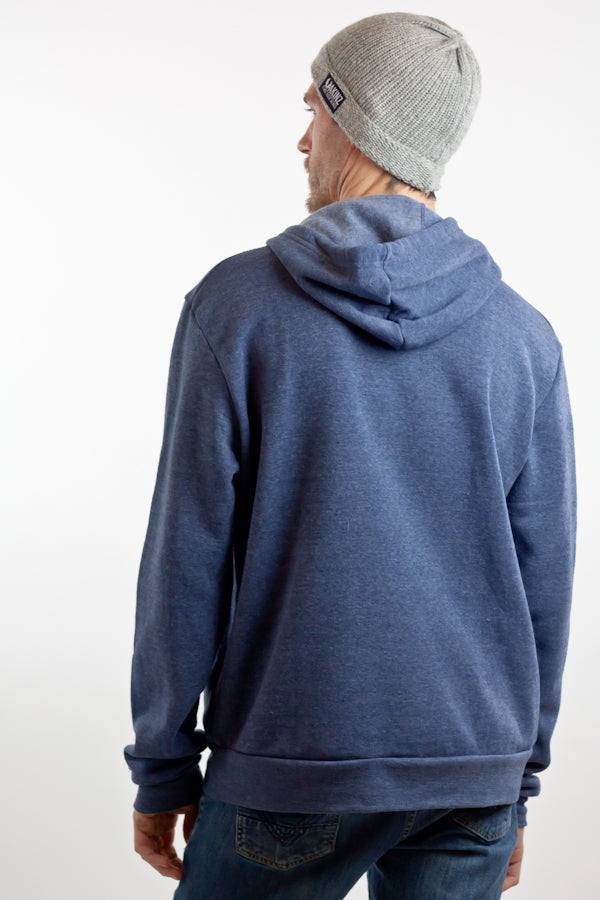 man wearing navy blue colorado flag fleece unisex sweatshirt