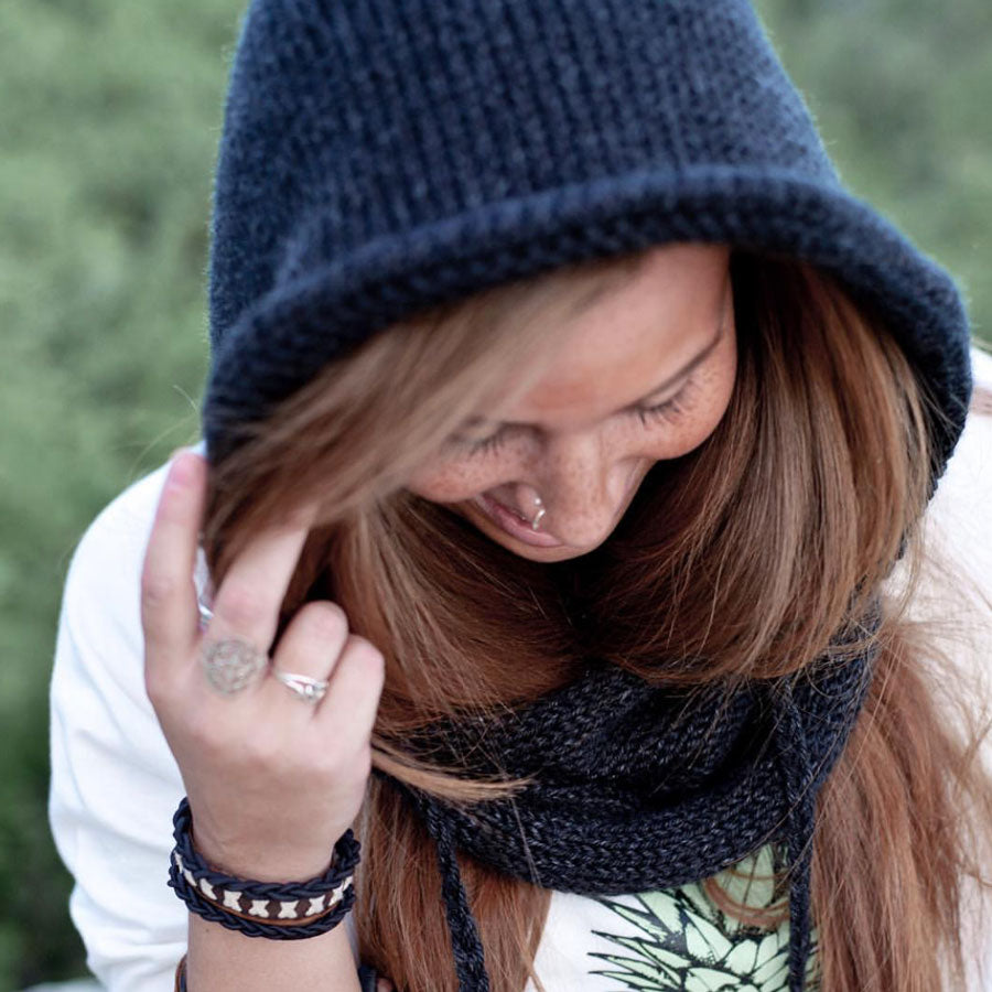 woman wearing navy hooded cowl