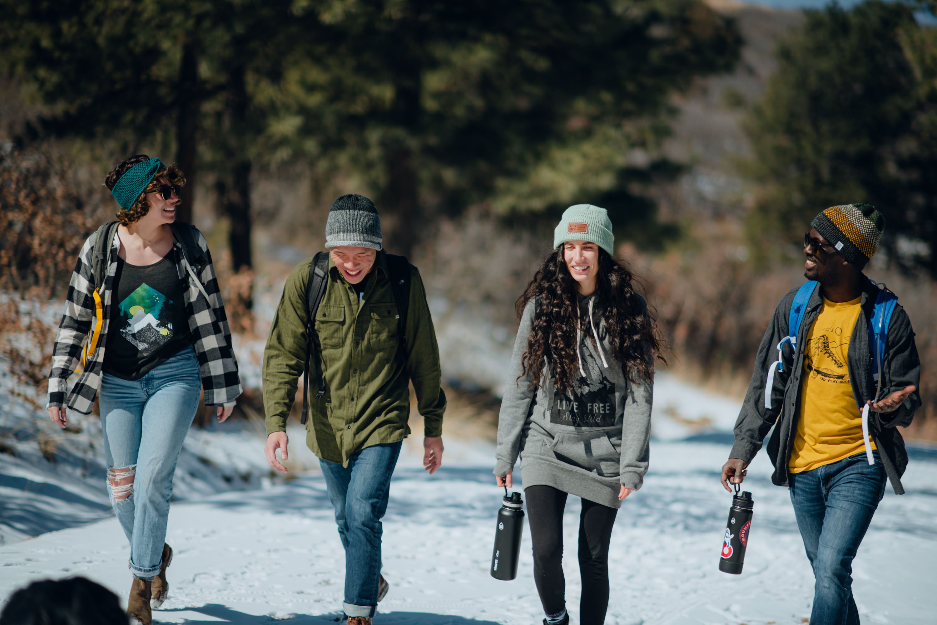 Lightweight beanies and layers for spring hikes