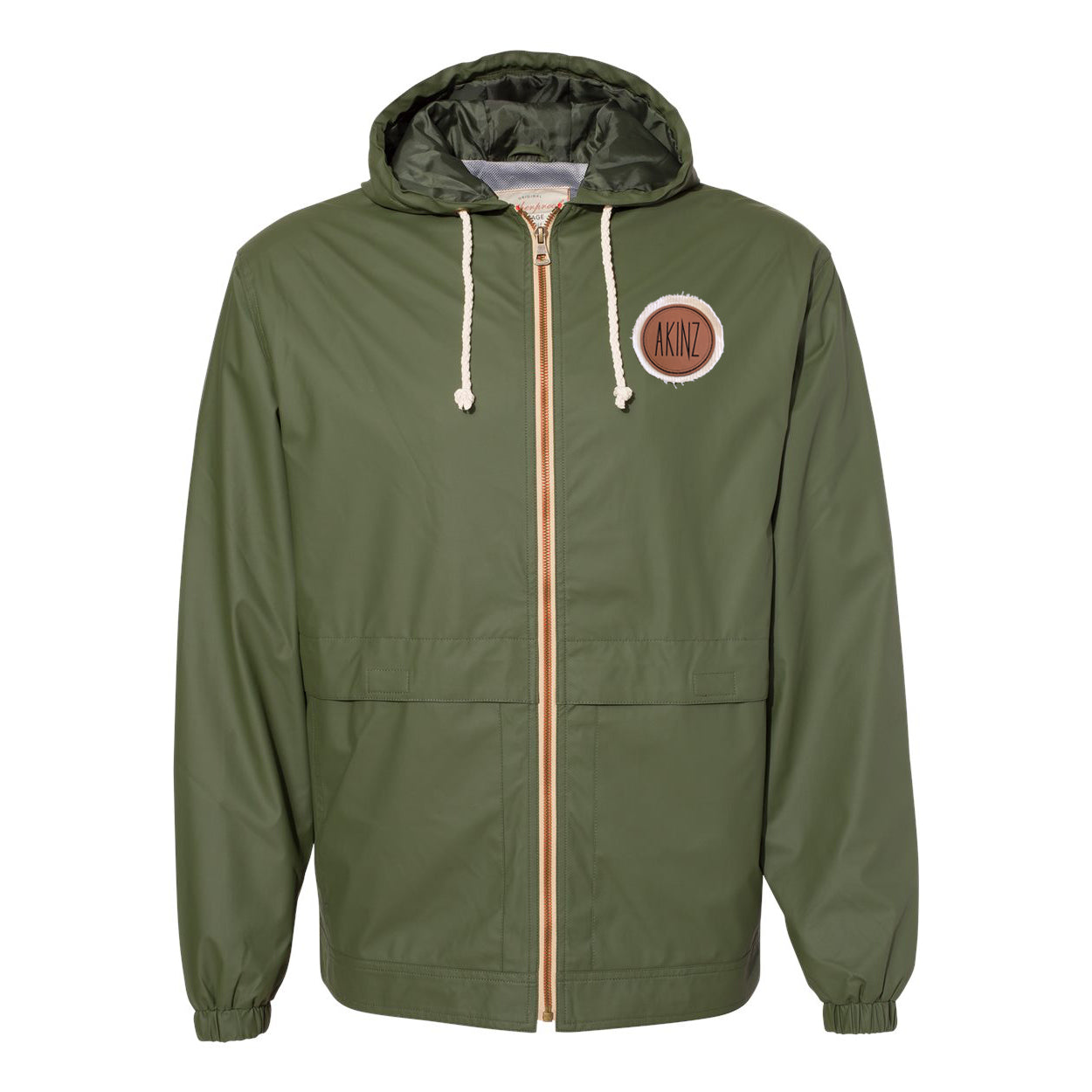 DocksideGreen-rain-jacket-with-faux-lether-patch.jpg