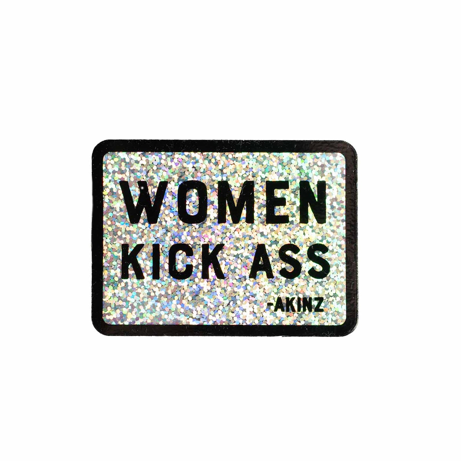 Glittery sticker with 'WOMEN KICK ASS' text on a white background