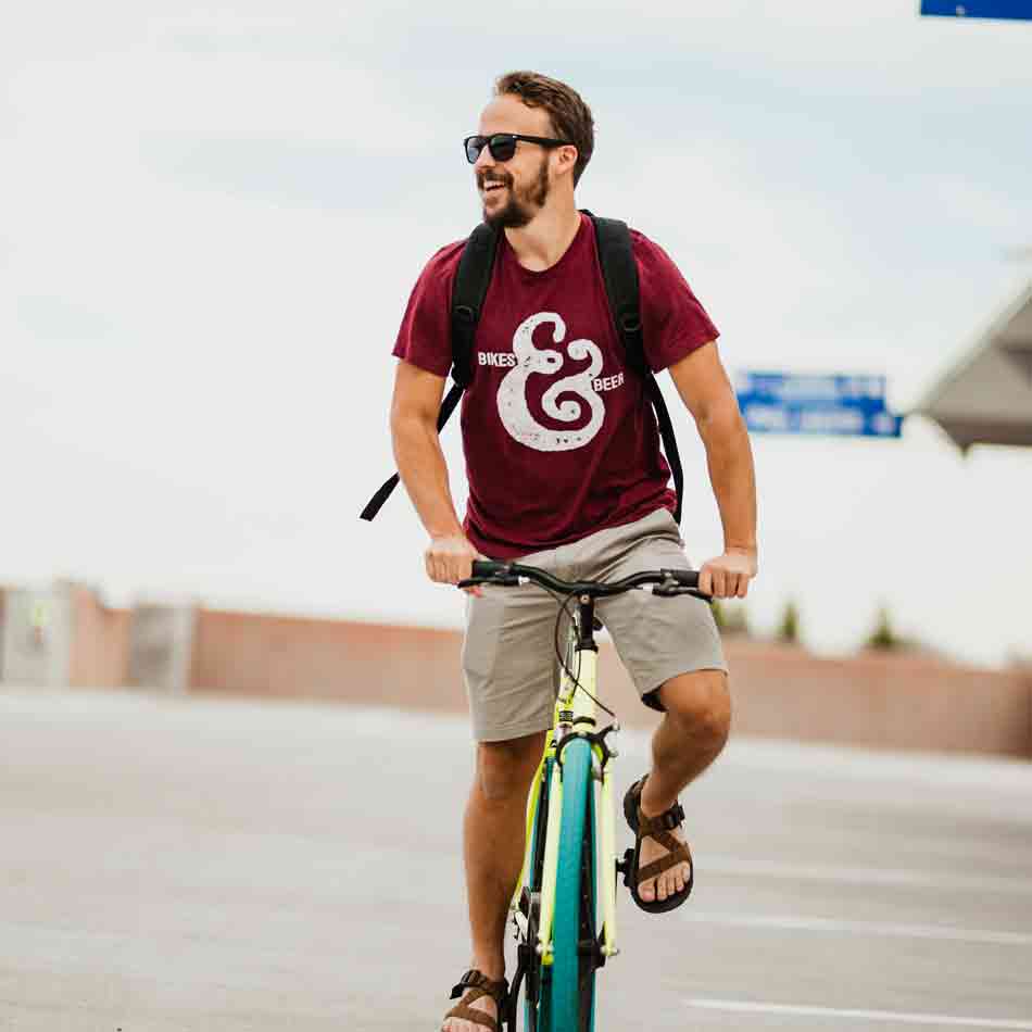 man on bike wearing funny bike and beer shirt
