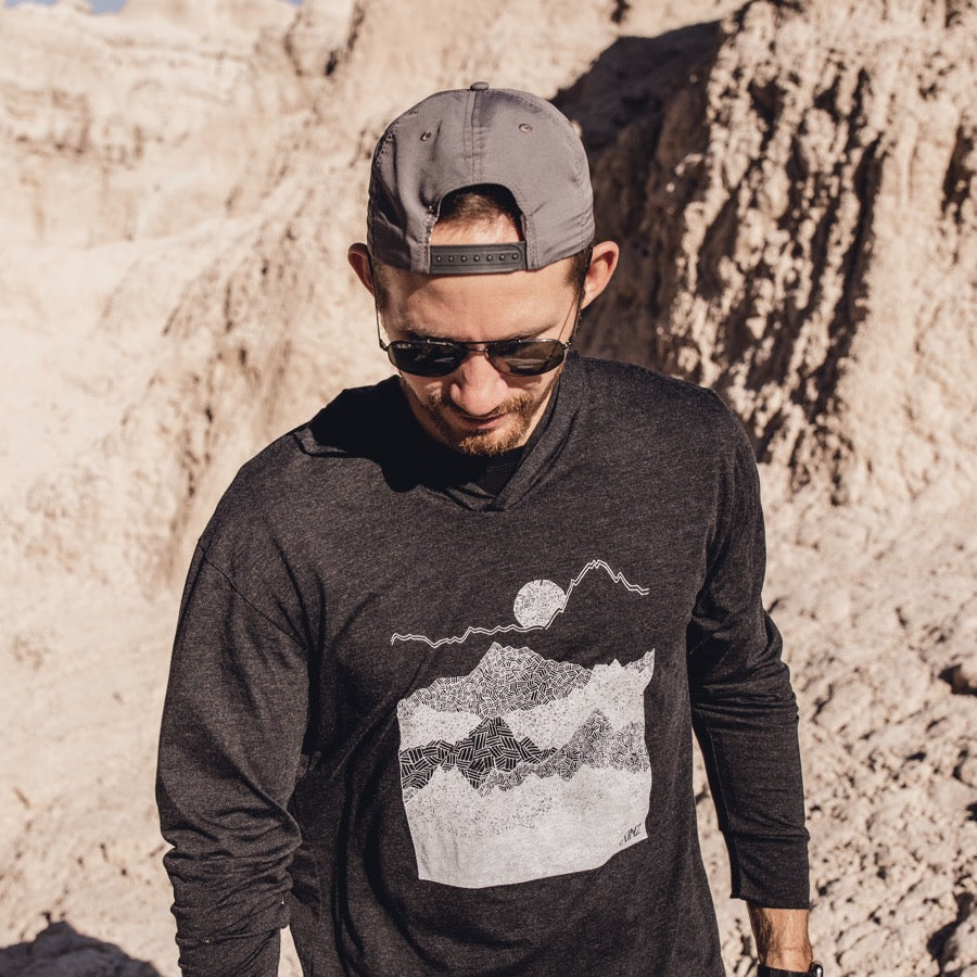 Lightweight long sleeve hooded t-shirt with geometric ascend mountains design hand printed in white ink