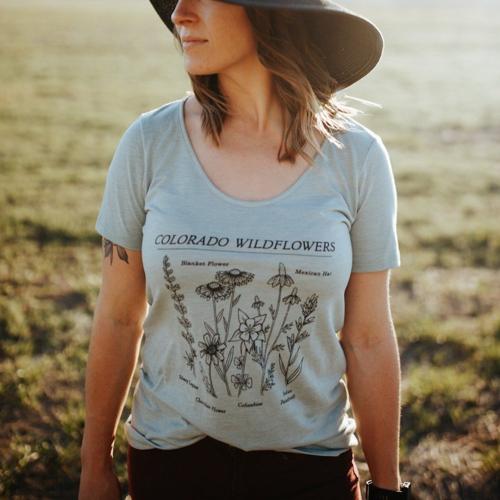woman wearing colorado wildflowers sage scoop neck top