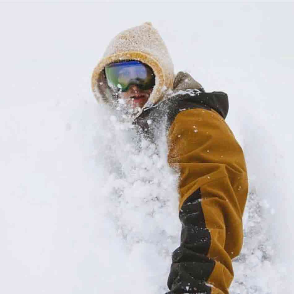 snowboarder wearing hooded cowl 