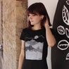 womens fit black tee with ascend geometric mountains handprinted design